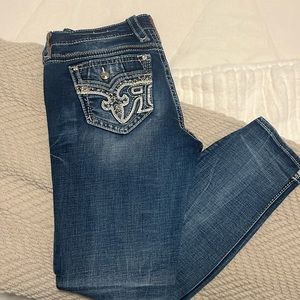 Mid rise woman’s rock revival ankle skinny jeans
